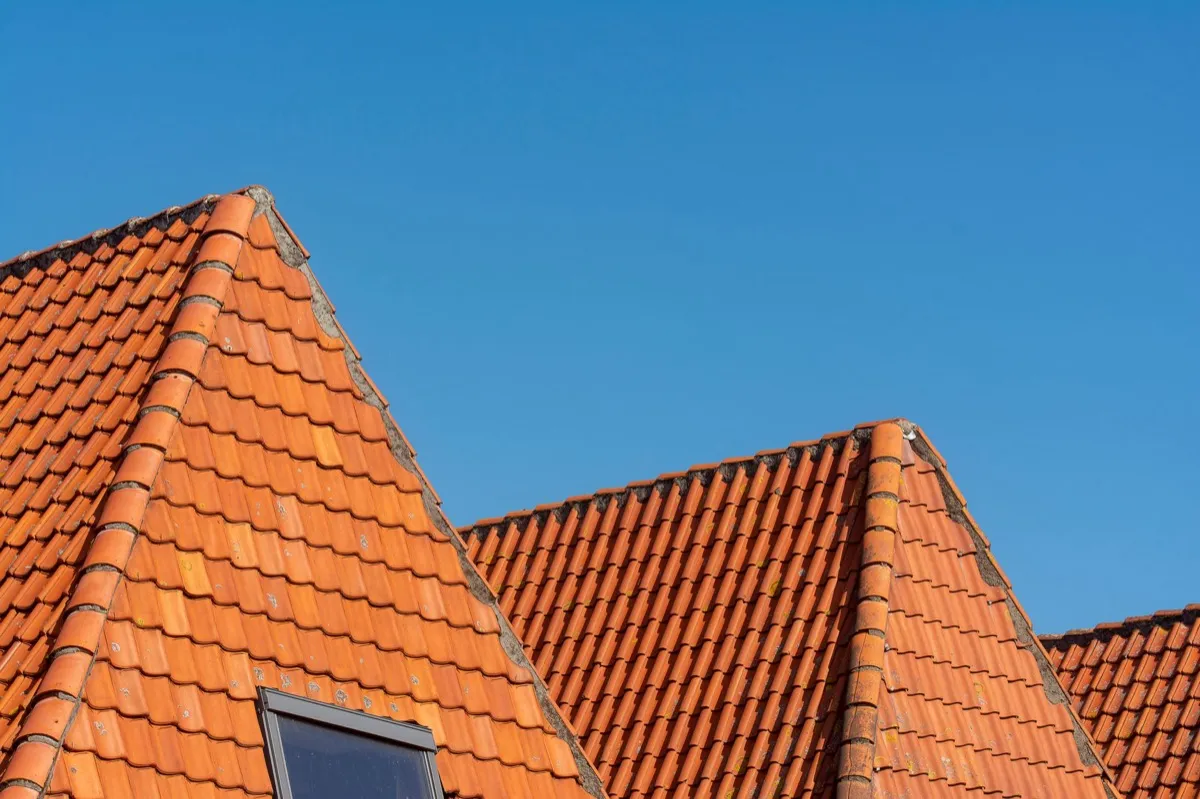 Clay barrel tile rooflines on homes in Greenville, SC